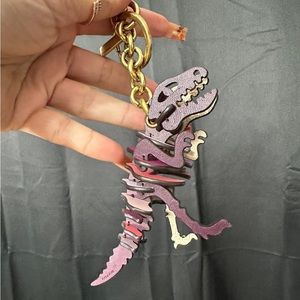 ISO: Coach Rexy Charm